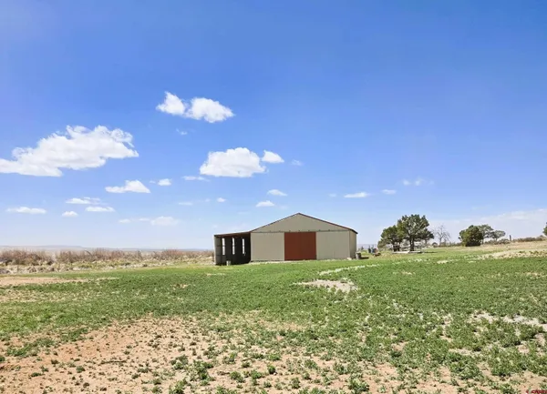 a house view with garden space