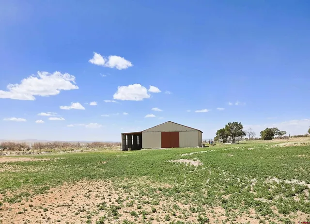 a house view with garden space