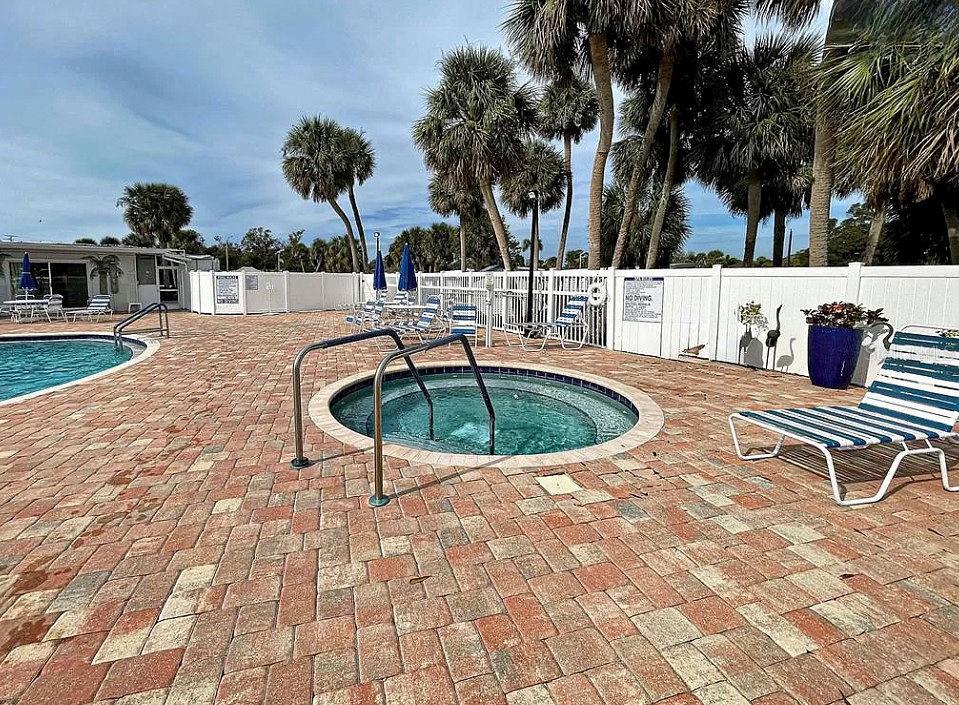 6000 Teahouse Road Venice, FL 34293 - Photo 11 of 13 a swimming pool with outdoor seating and yard