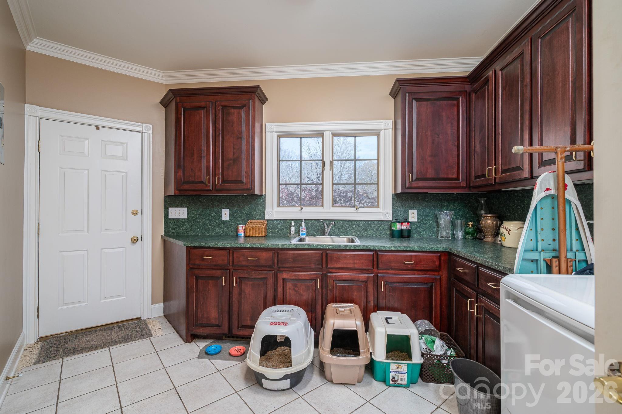 109 Wright Road Kings Mountain, NC 28086 - Photo 12 of 36 a kitchen with a sink a stove and cabinets