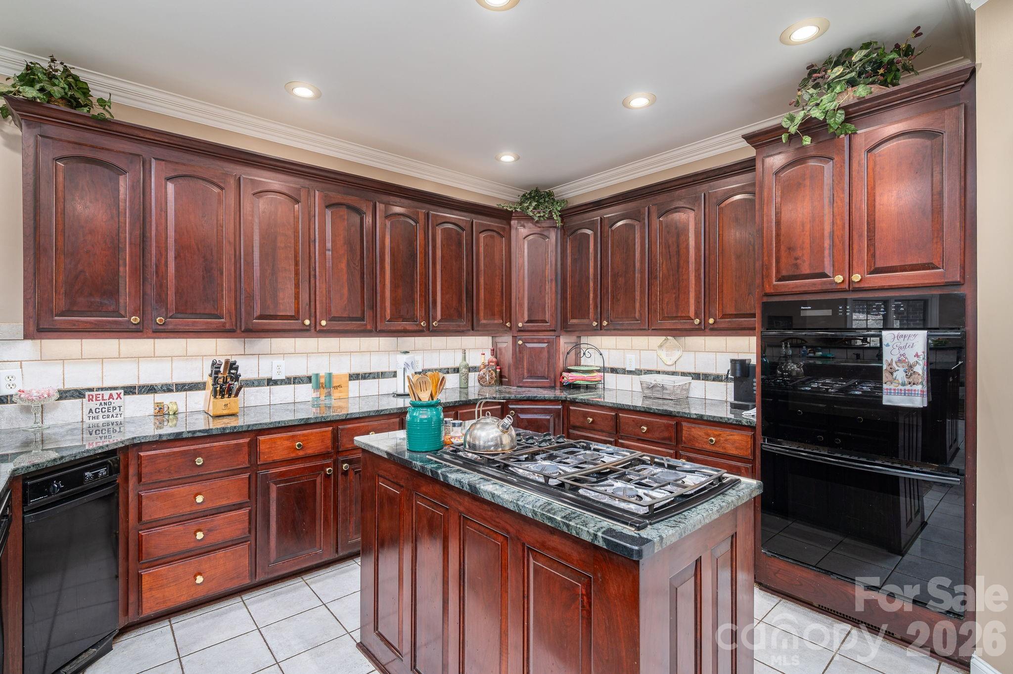 109 Wright Road Kings Mountain, NC 28086 - Photo 14 of 36 a kitchen with a stove sink and cabinets