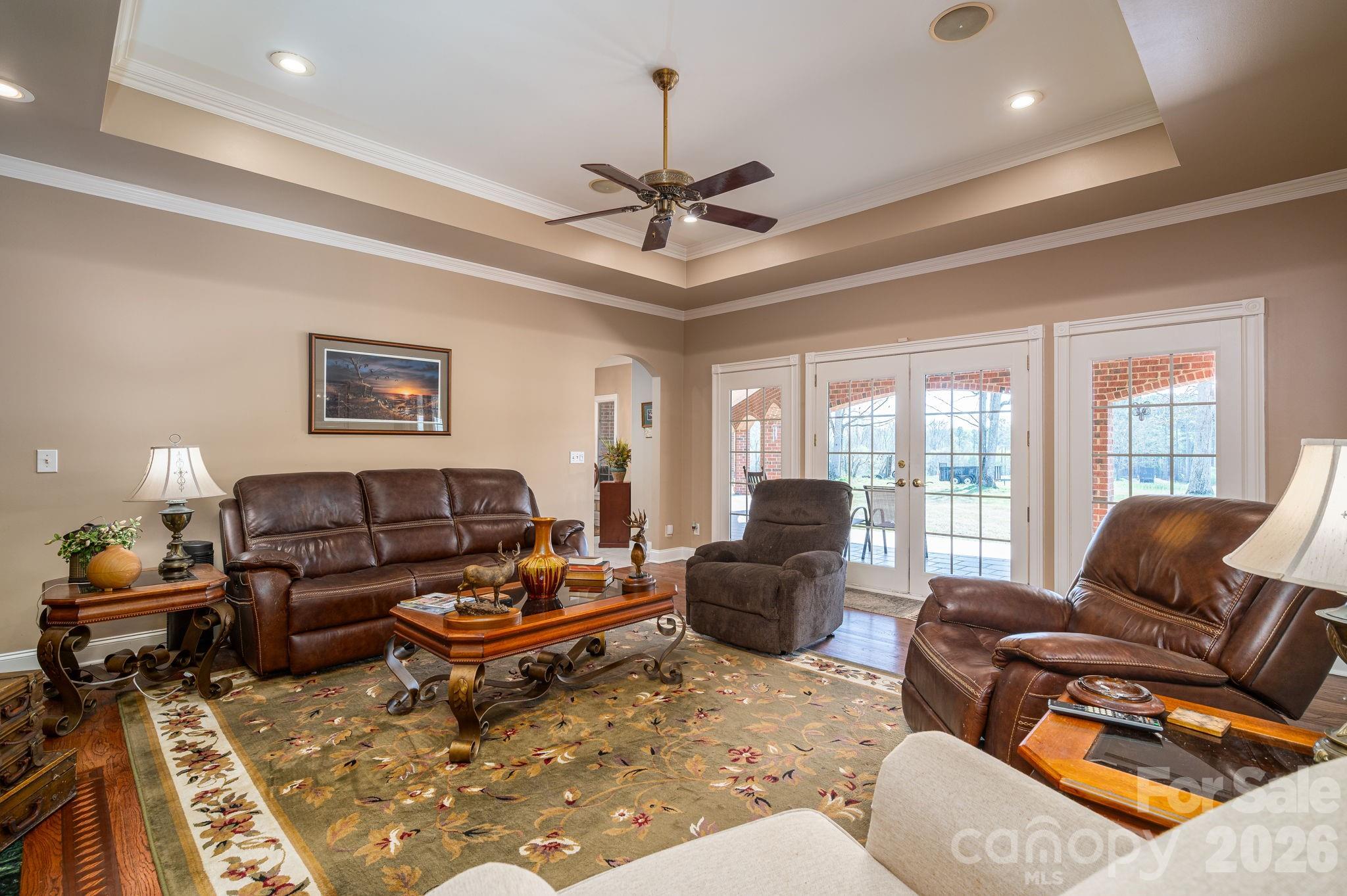 109 Wright Road Kings Mountain, NC 28086 - Photo 17 of 36 a living room with furniture ceiling fan and a rug