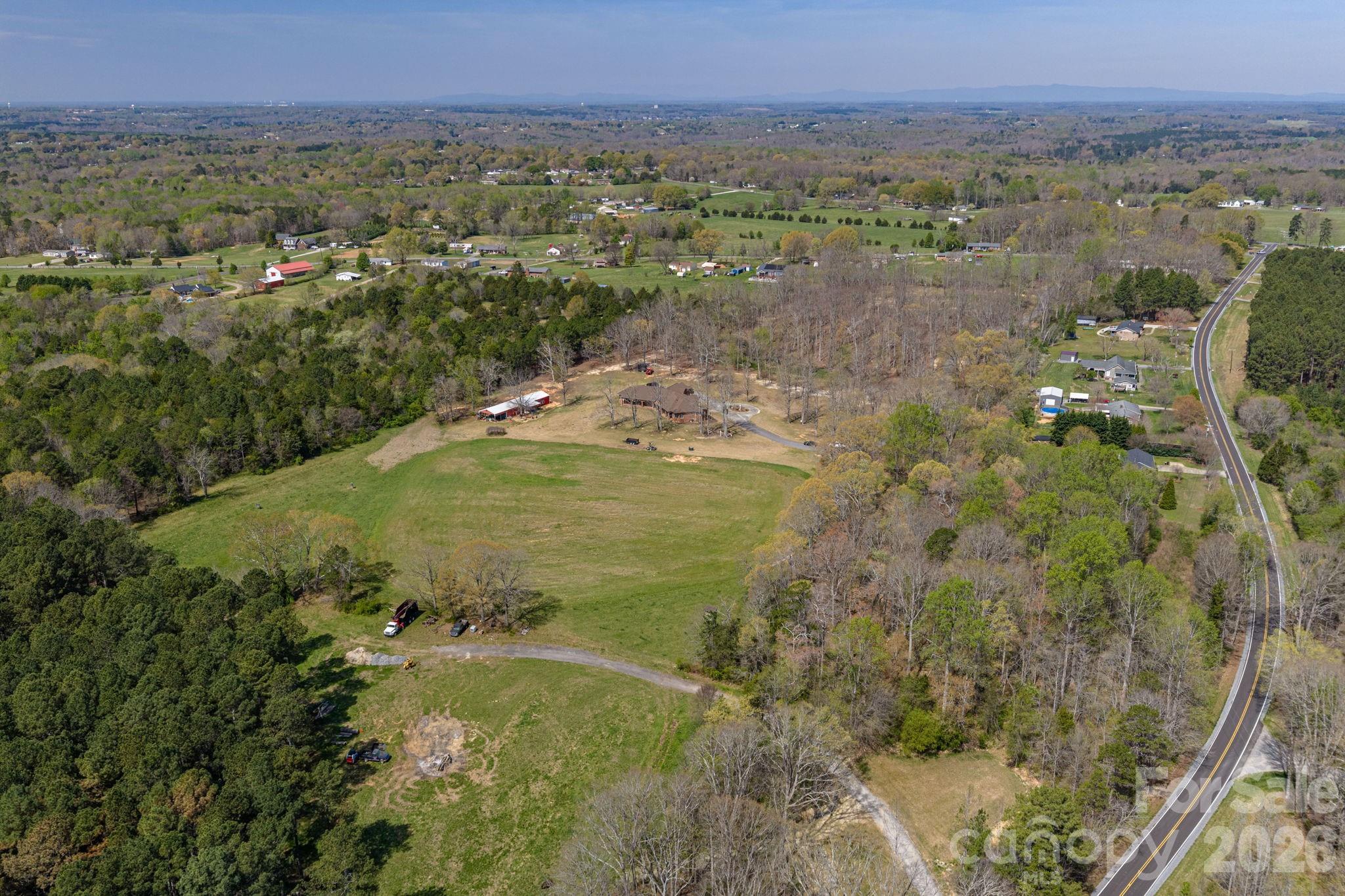 109 Wright Road Kings Mountain, NC 28086 - Photo 26 of 36 a view of a lake with a yard