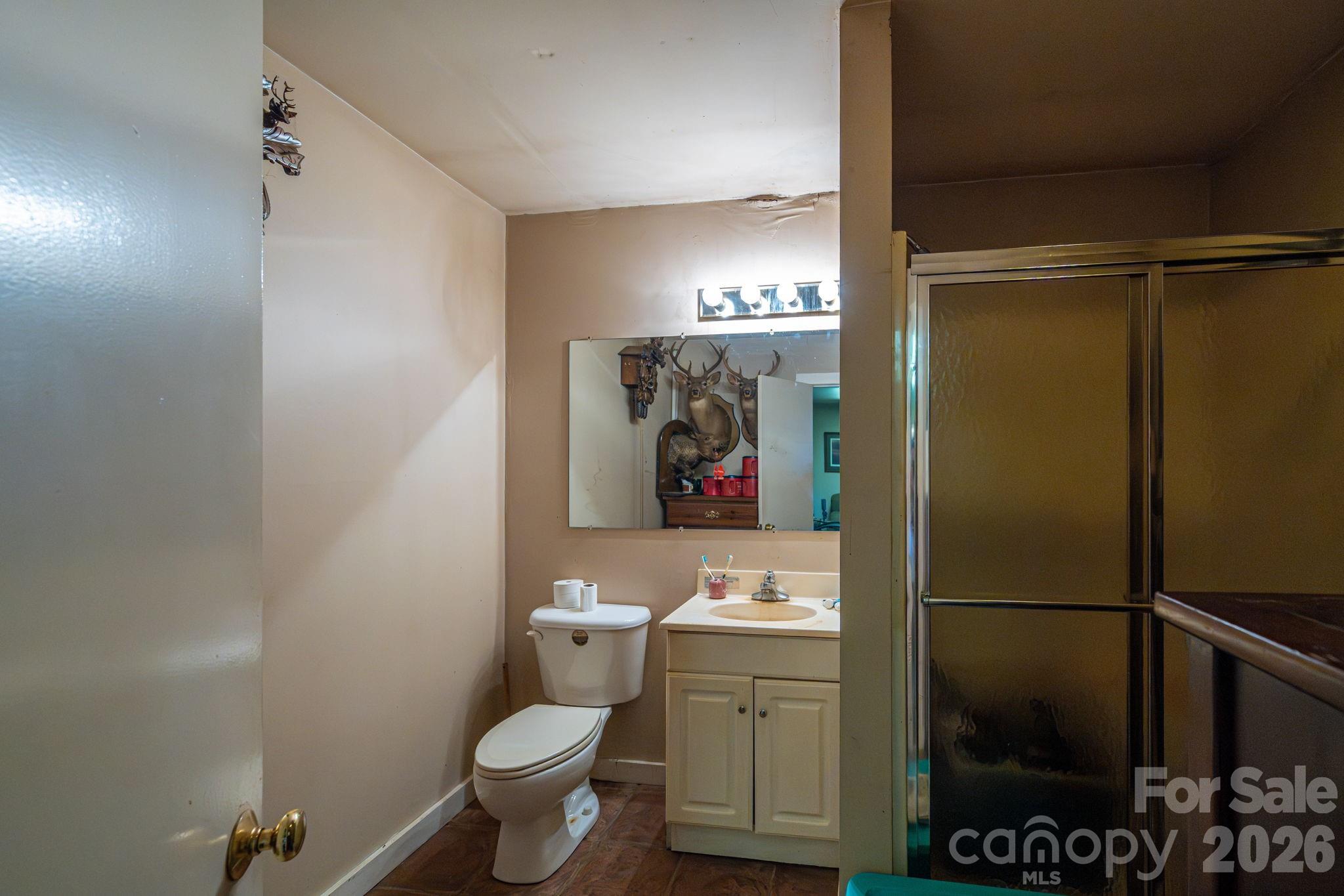 109 Wright Road Kings Mountain, NC 28086 - Photo 30 of 36 a bathroom with a toilet sink and shower