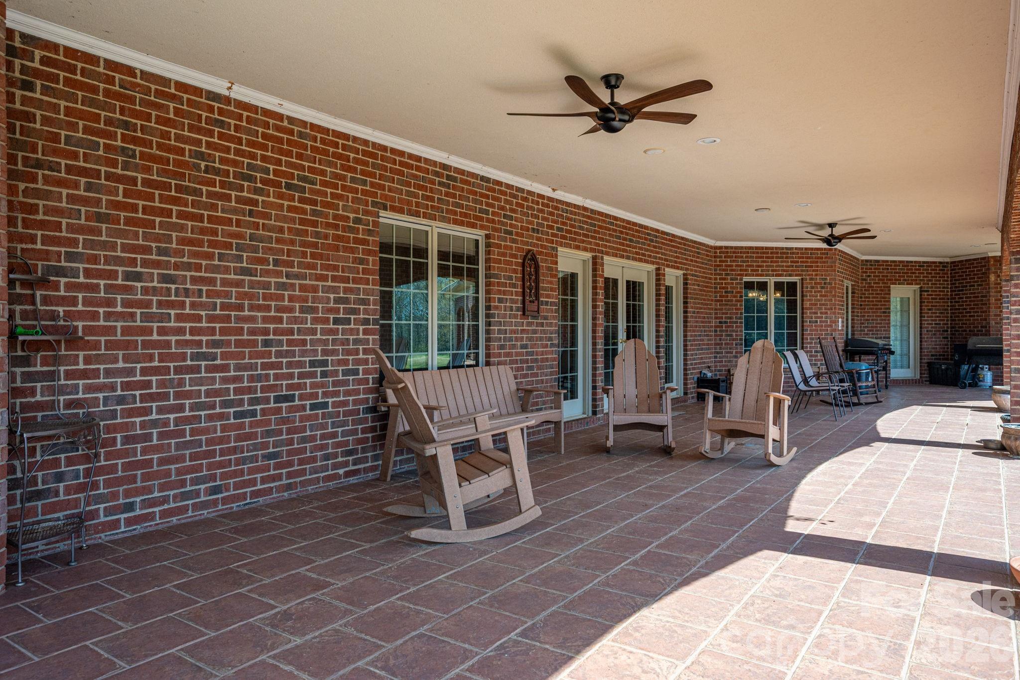 109 Wright Road Kings Mountain, NC 28086 - Photo 35 of 36 a view of a patio with a table and chairs