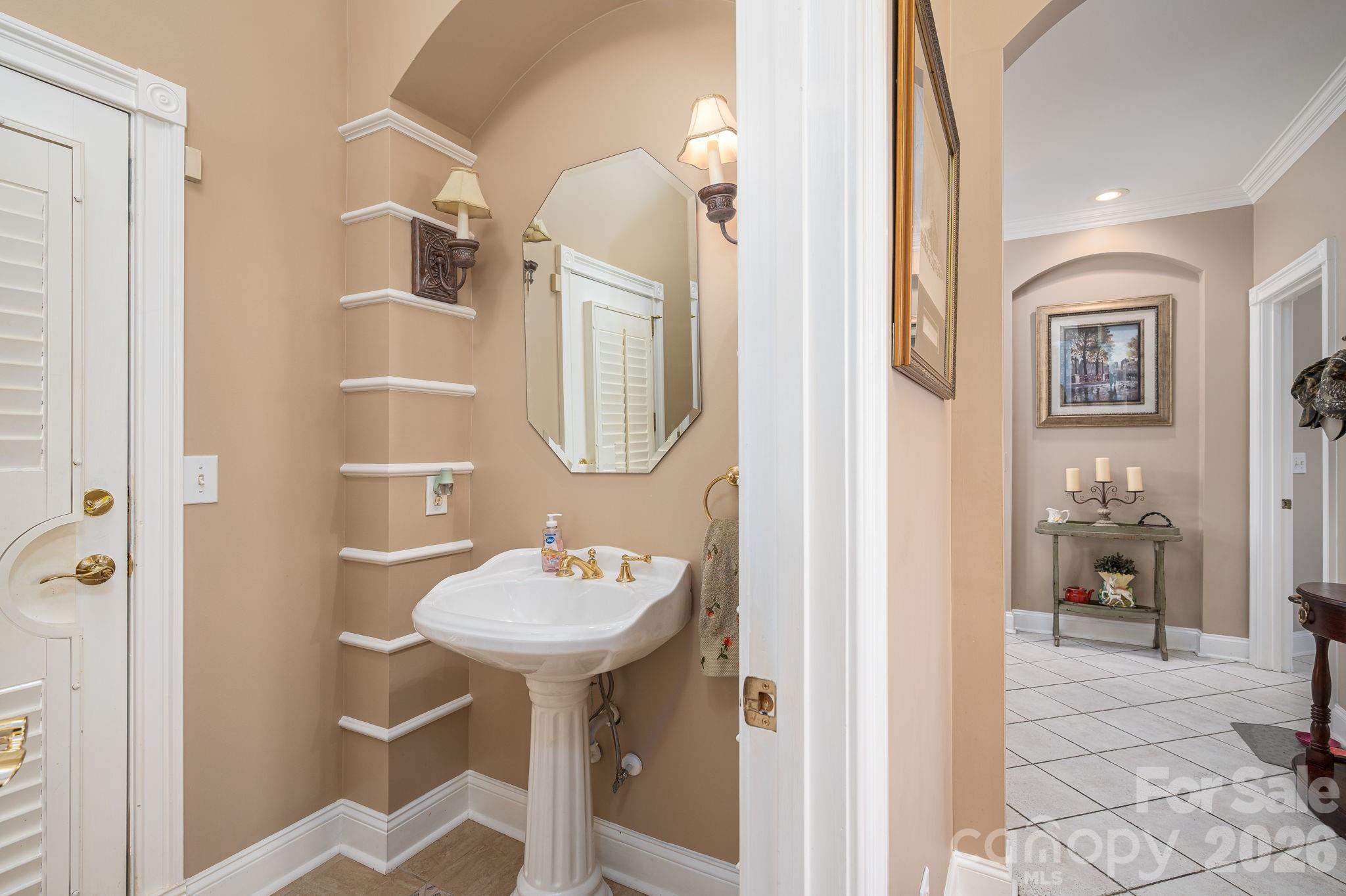 109 Wright Road Kings Mountain, NC 28086 - Photo 10 of 36 a bathroom with a sink a mirror and a shower