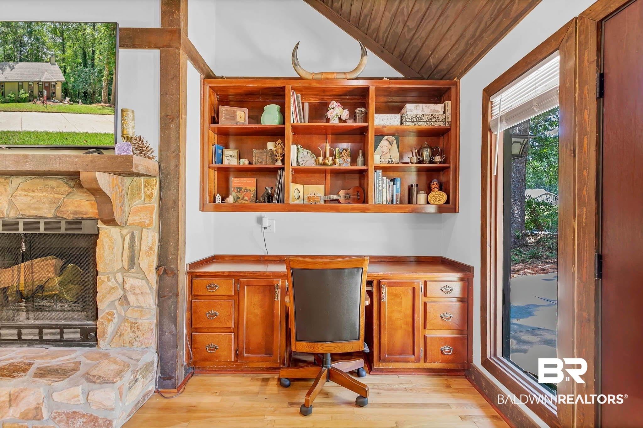 332 Ridgewood Drive Daphne, AL 36526 - Photo 15 of 48 Office featuring light wood finished floors, a fireplace, built in study area, wood ceiling, and lofted ceiling