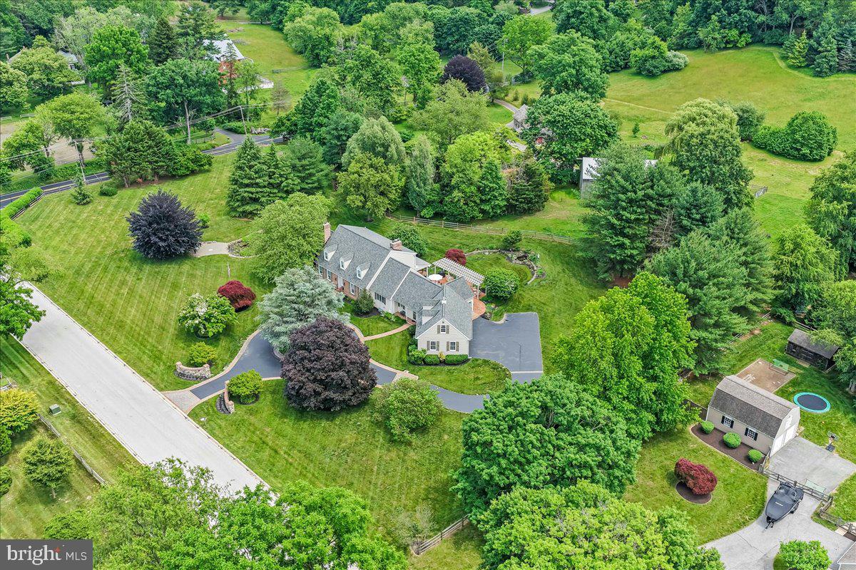 7 Bolingbroke Road West Chester, PA 19382 - Photo 57 of 86 Lush estate nestled in vibrant greenery.