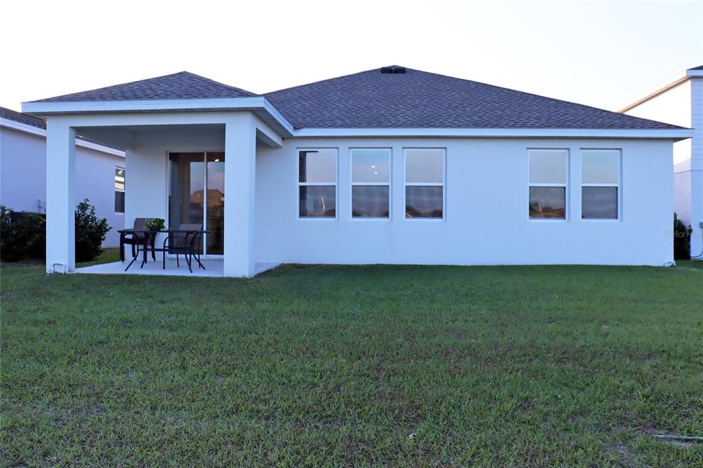 34558 Shellback Street Leesburg, FL 34788 - Photo 22 of 36 a front view of house with yard
