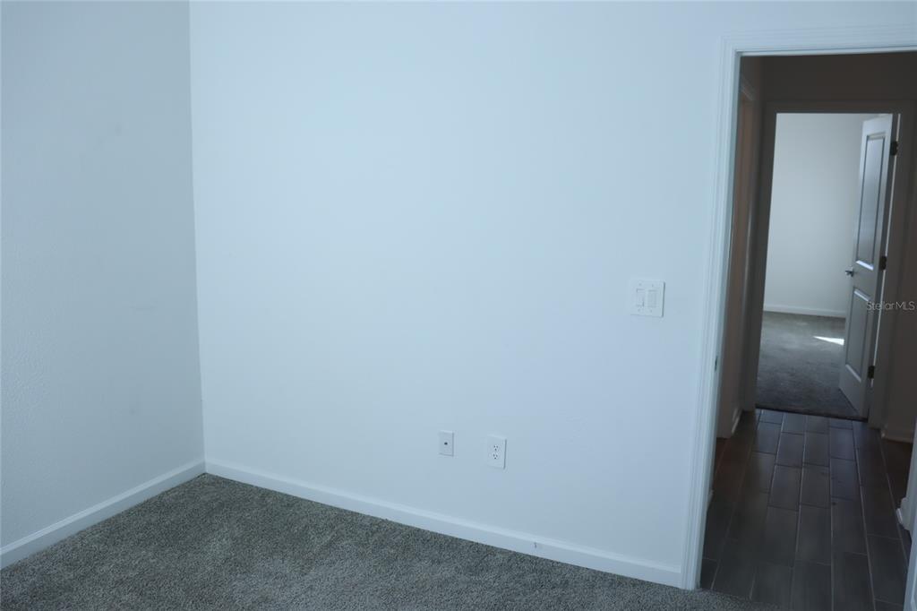 34558 Shellback Street Leesburg, FL 34788 - Photo 28 of 36 a view of a hallway