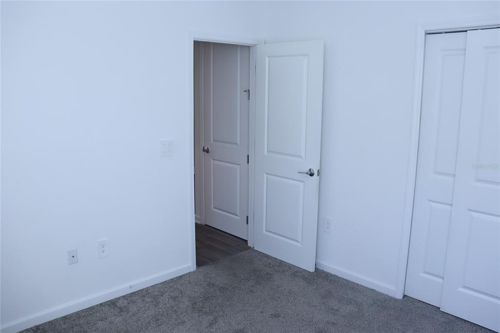 34558 Shellback Street Leesburg, FL 34788 - Photo 29 of 36 a view of an empty room