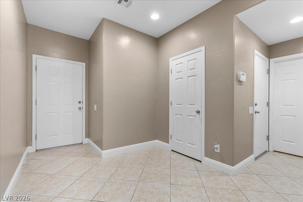 2627 Dirleton Place Henderson, NV 89044 - Photo 9 of 42 Clean lines and a neutral palette welcome you to beautiful home