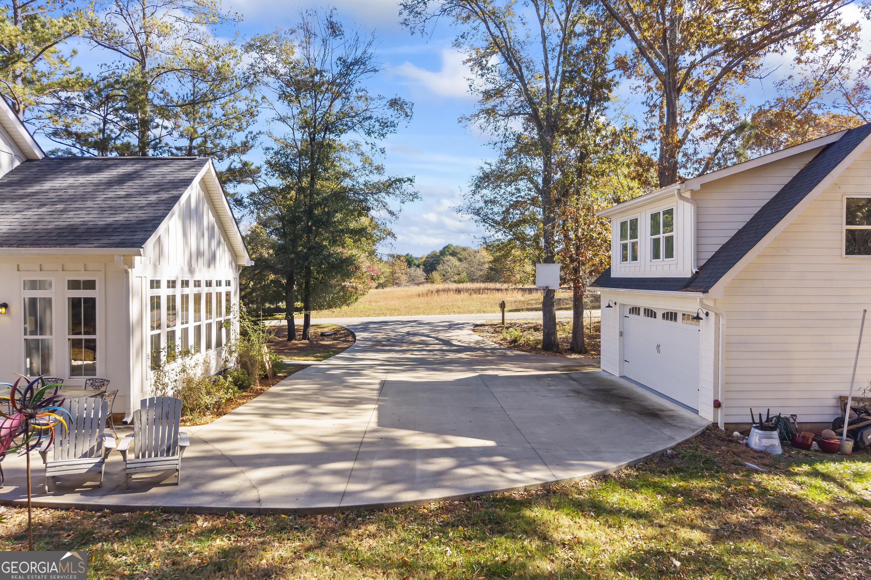 32 Shirleys Way Hartwell, GA 30643 - Photo 11 of 42 a view of a house with backyard and trees