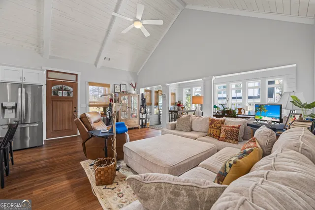 a view of a backyard with sitting area