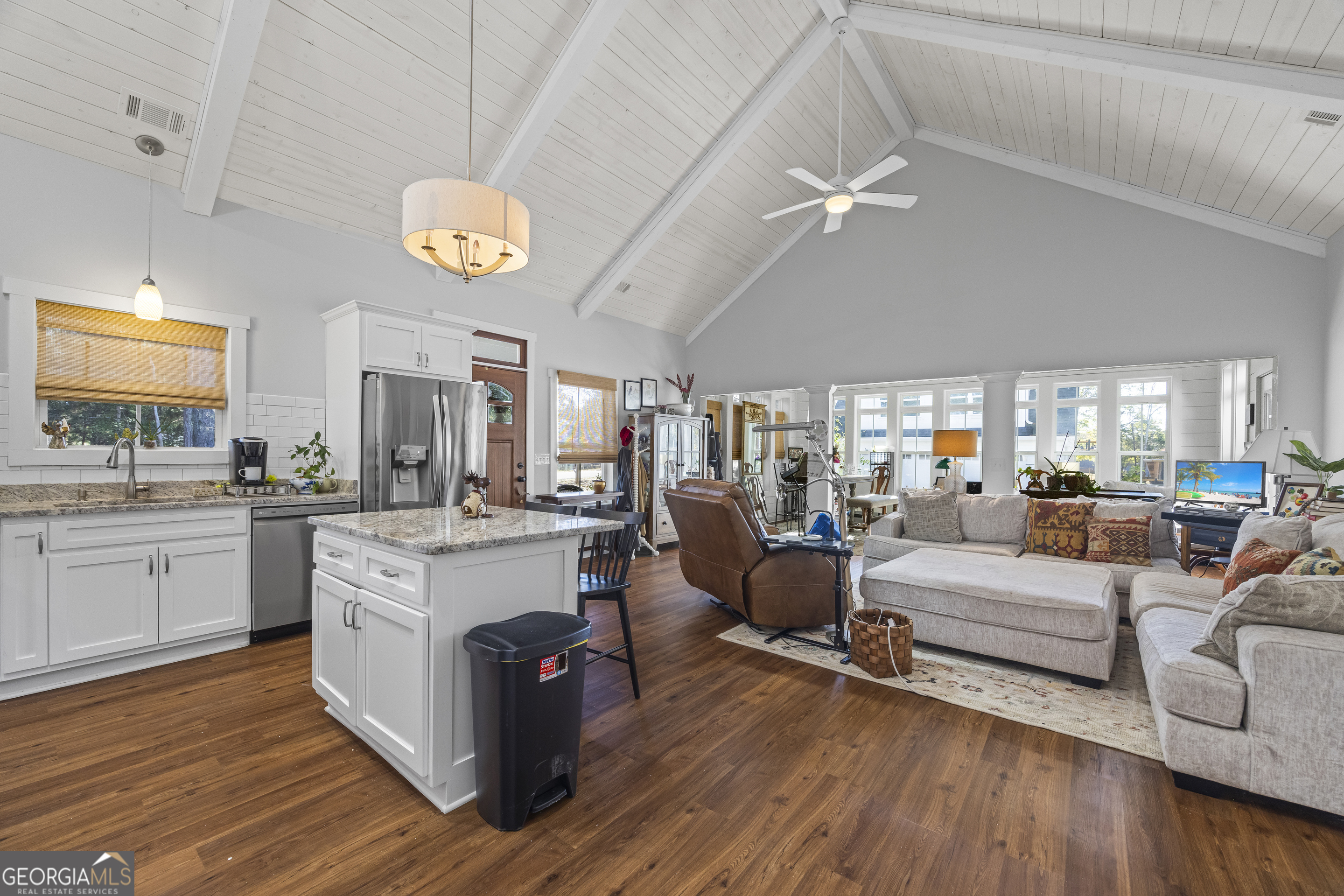 32 Shirleys Way Hartwell, GA 30643 - Photo 23 of 42 a living room with furniture a fireplace and wooden floor