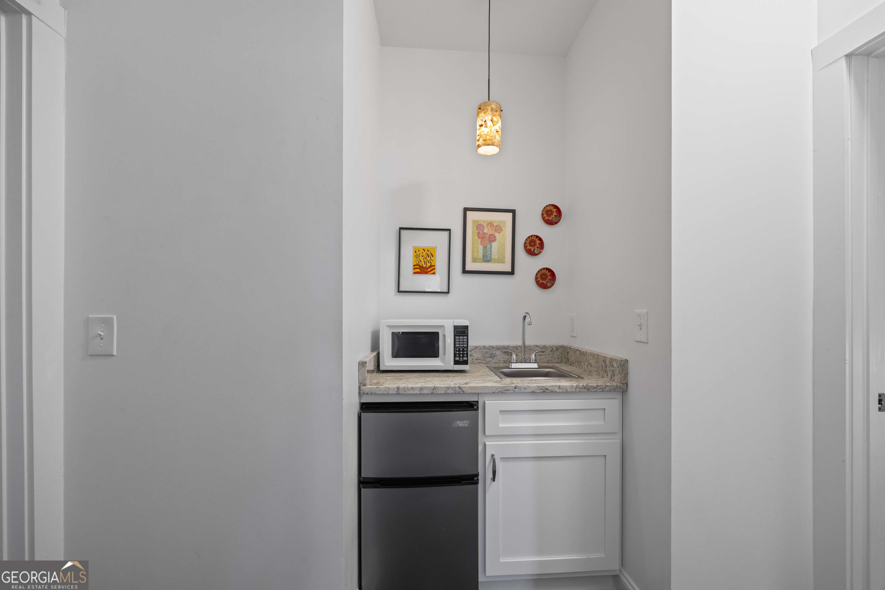 32 Shirleys Way Hartwell, GA 30643 - Photo 26 of 42 a bathroom with a sink and a refrigerator