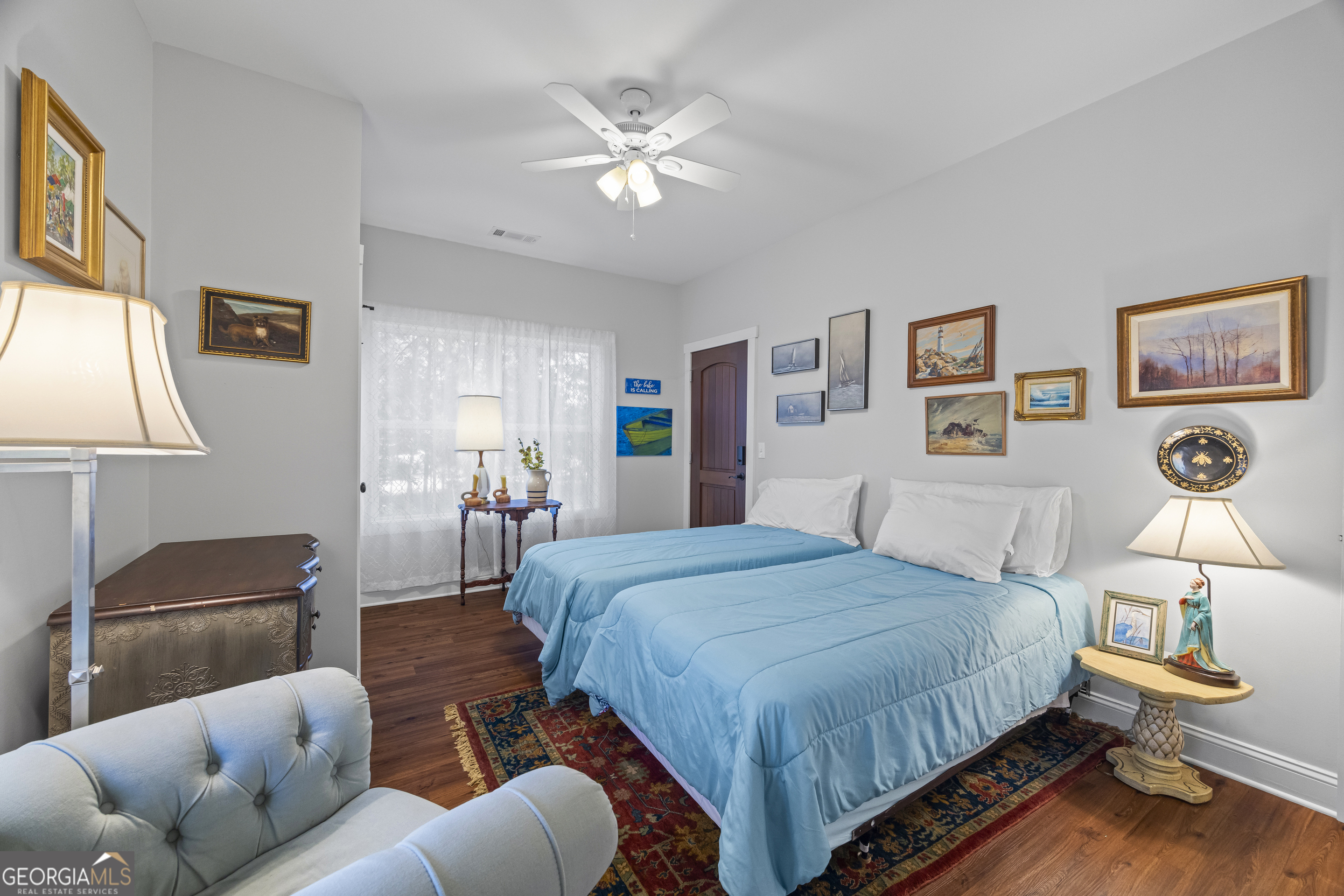 32 Shirleys Way Hartwell, GA 30643 - Photo 27 of 42 a bedroom with a bed couch and window