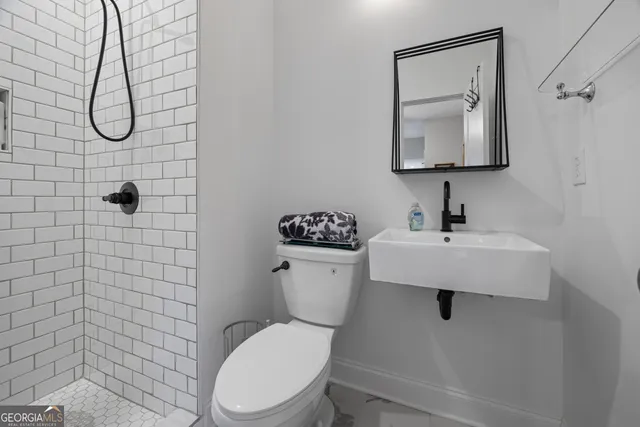 a bed room with a bed and furniture