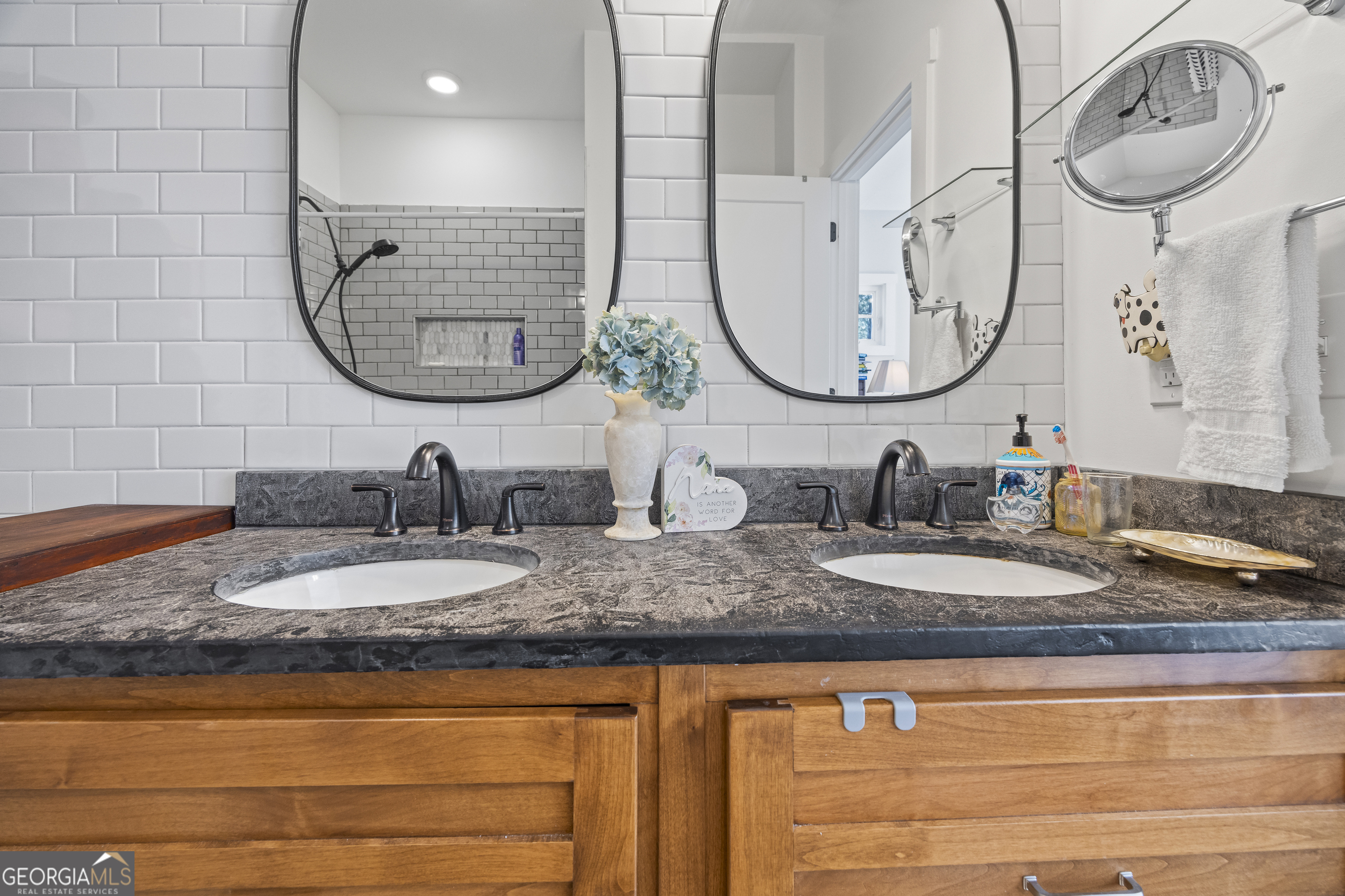 32 Shirleys Way Hartwell, GA 30643 - Photo 34 of 42 a bathroom with a granite countertop double vanity sinks and a mirror
