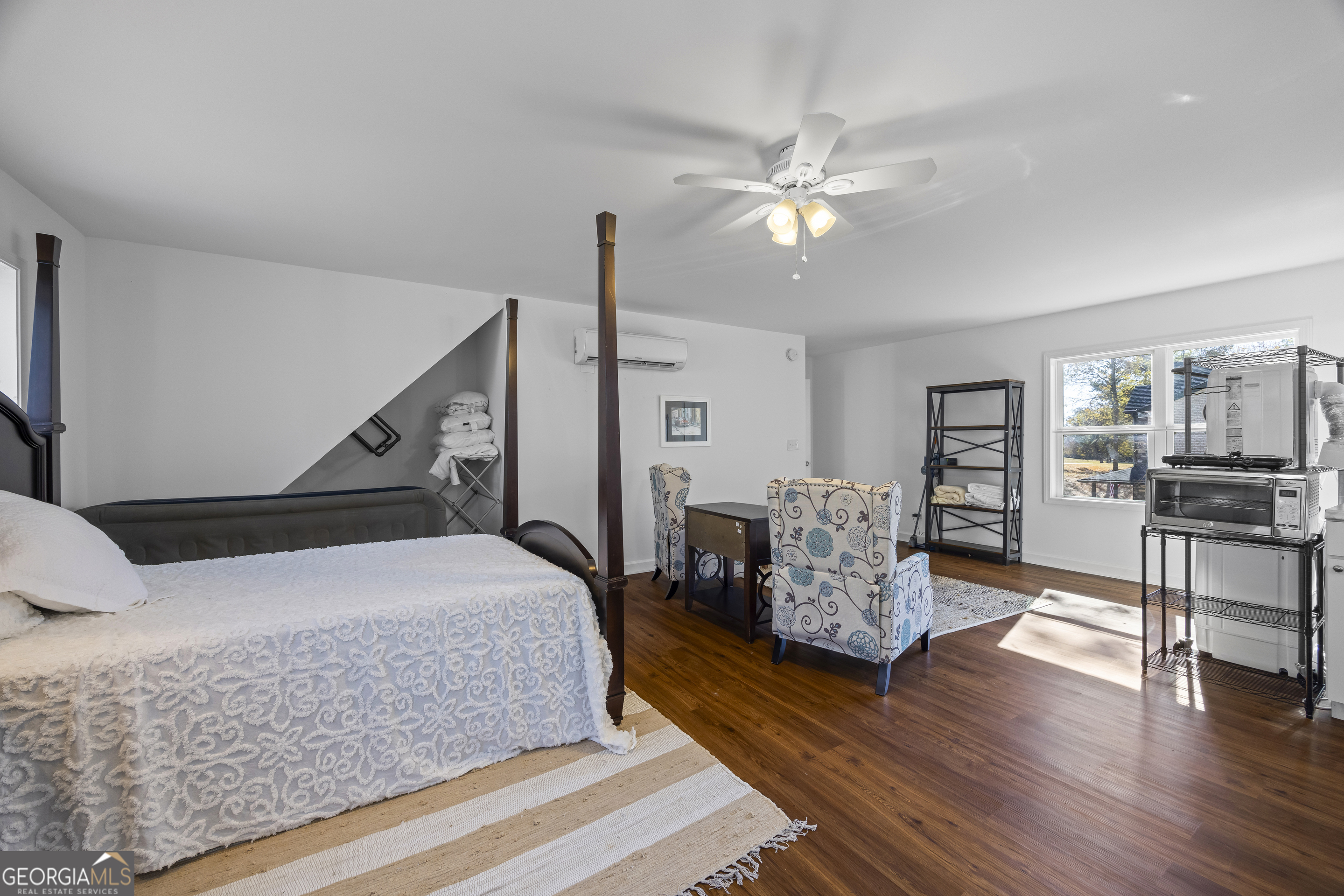 32 Shirleys Way Hartwell, GA 30643 - Photo 37 of 42 a bedroom with furniture and wooden floor