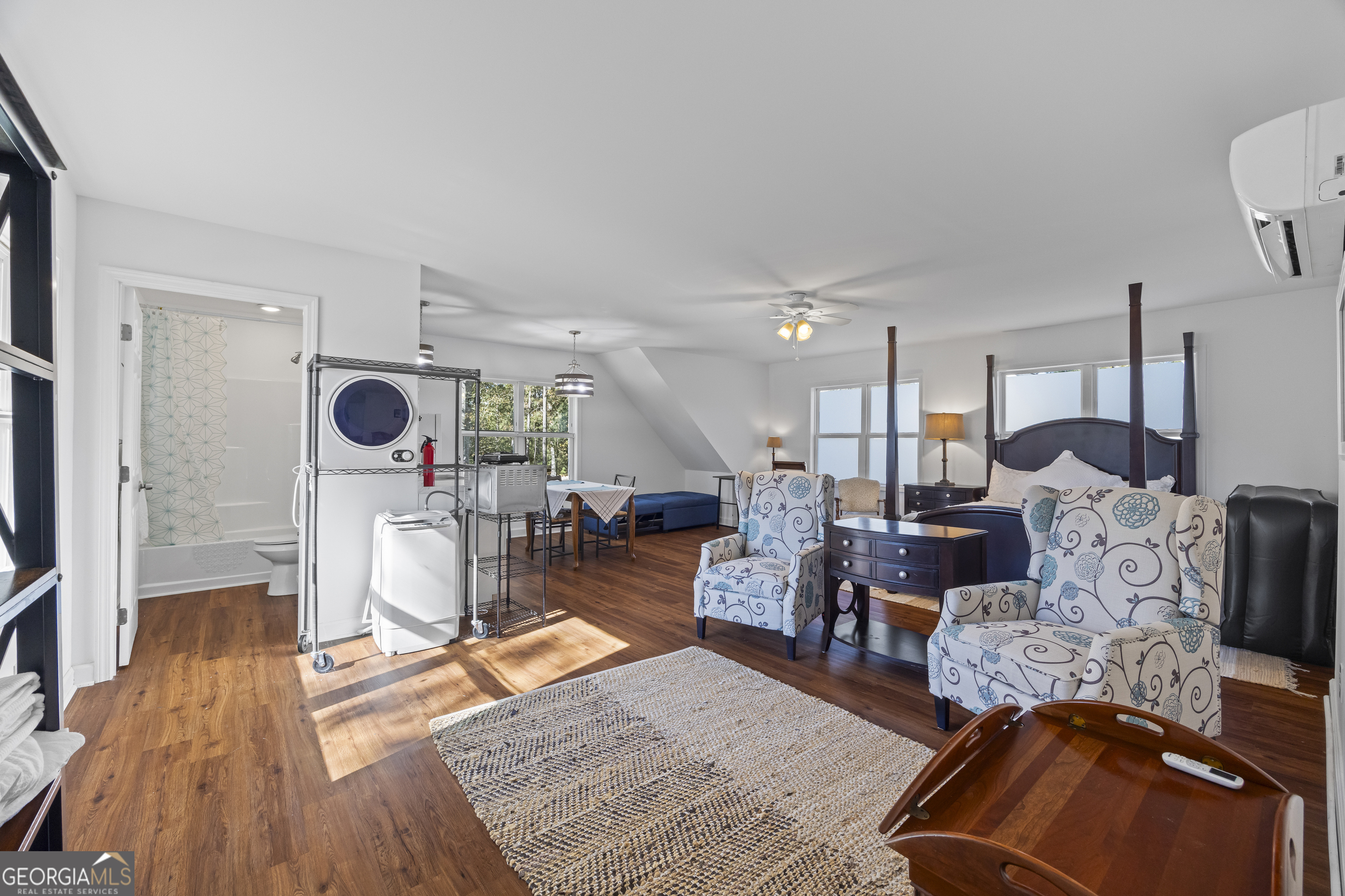 32 Shirleys Way Hartwell, GA 30643 - Photo 38 of 42 a living room with furniture and a wooden floor