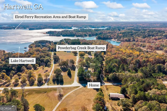 a view of a house with large windows