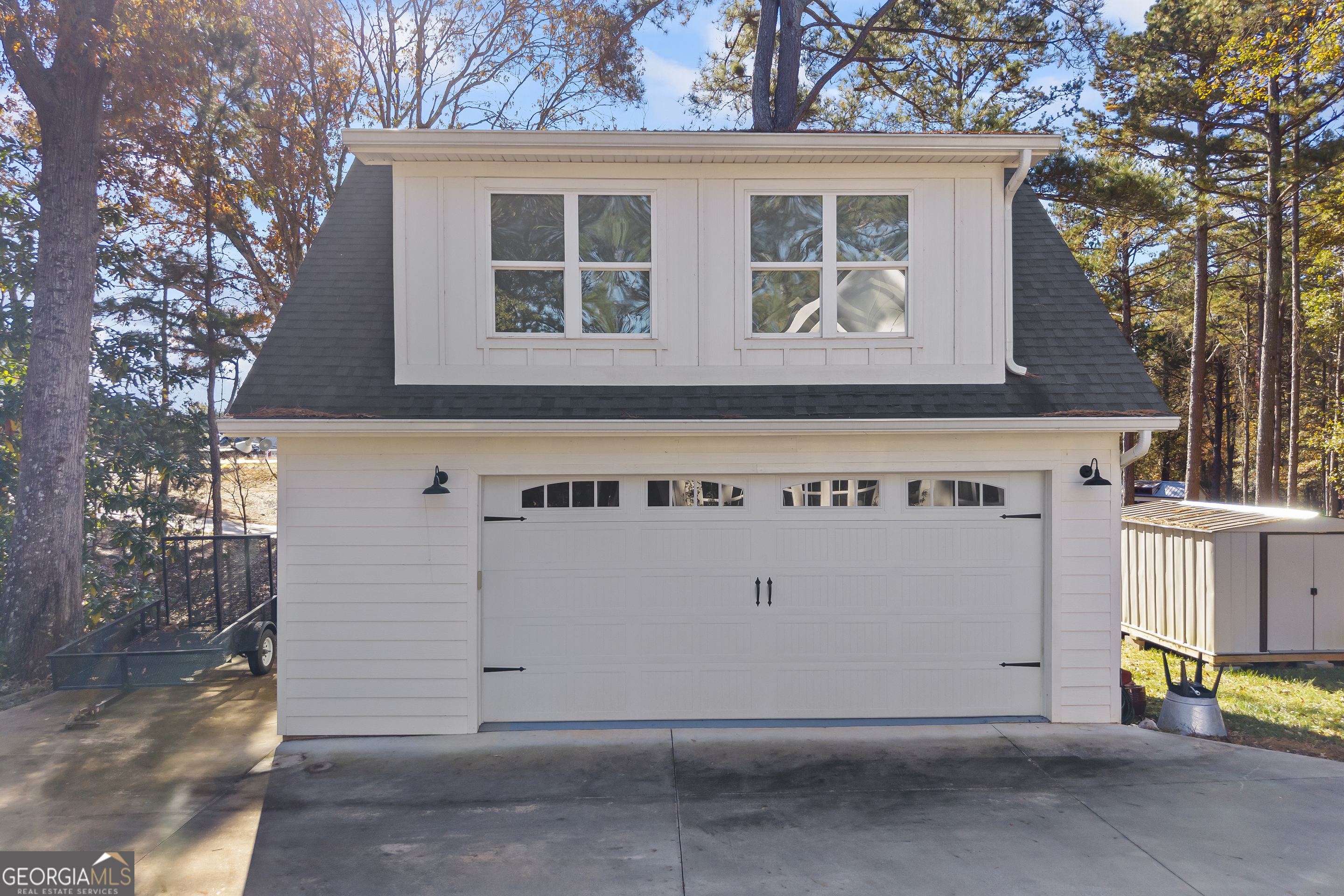 32 Shirleys Way Hartwell, GA 30643 - Photo 8 of 42 a view of a house with large windows