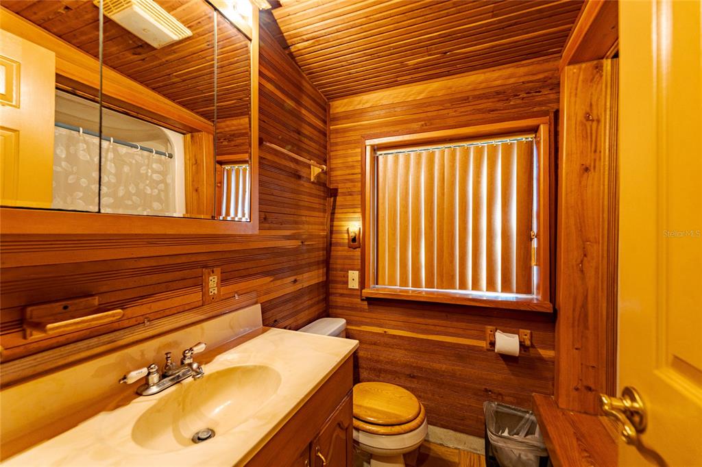 11053 Mulberry Landing Road North Hilliard, FL 32046 - Photo 21 of 100 a bathroom with a sink a toilet and tub