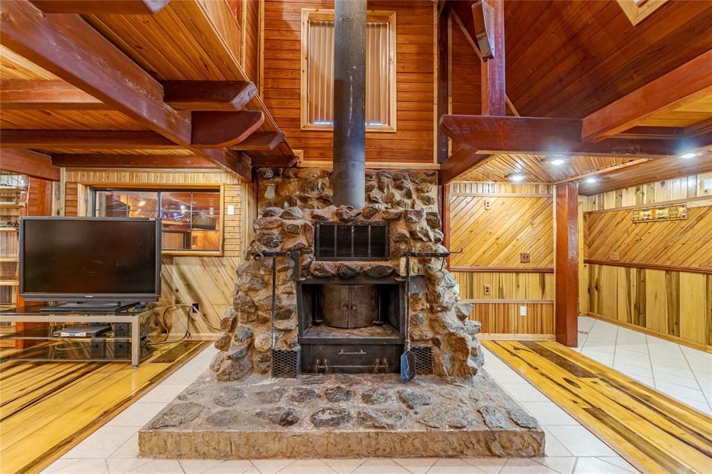 11053 Mulberry Landing Road North Hilliard, FL 32046 - Photo 27 of 100 a living room with a flat screen tv and a rug