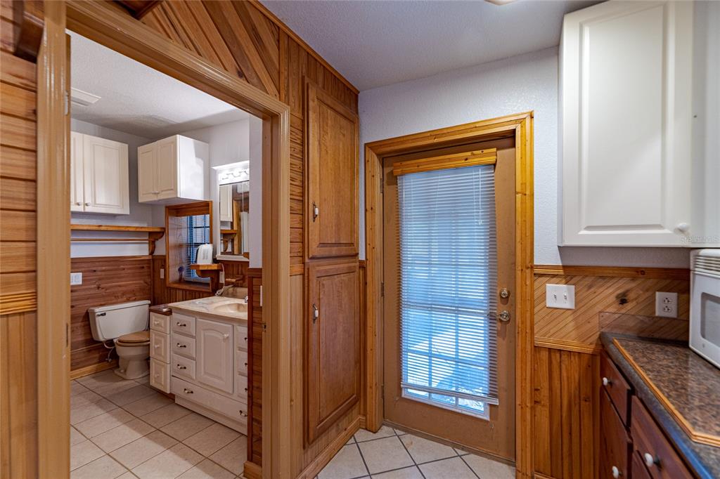 11053 Mulberry Landing Road North Hilliard, FL 32046 - Photo 70 of 100 a view of a kitchen from the hallway
