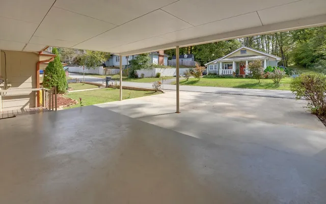 a view of a house with a street