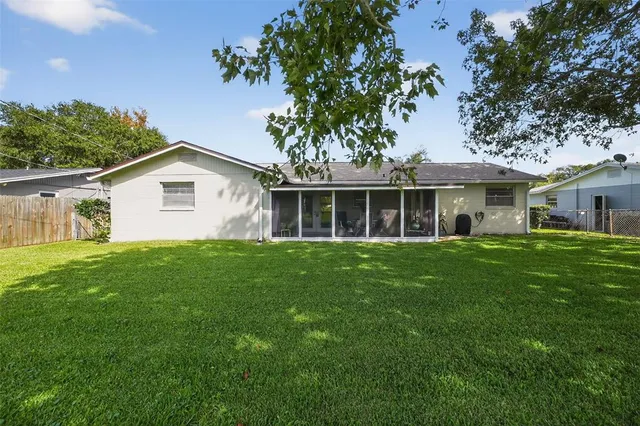 a view of an house that has garden