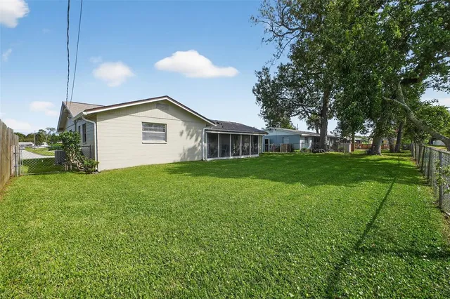 a view of a house with a big yard