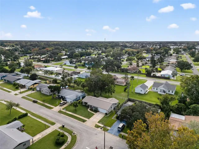 an aerial view of a city with lots of residential buildings