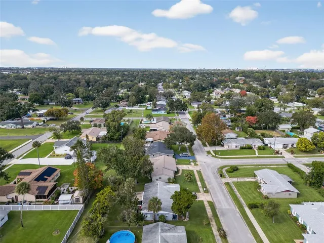 an aerial view of a city with lots of residential buildings