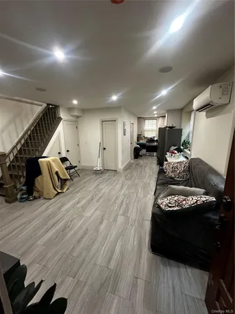 a living room with furniture fireplace and a flat screen tv