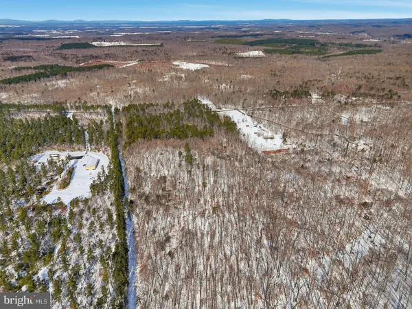 a view of a lake from a yard