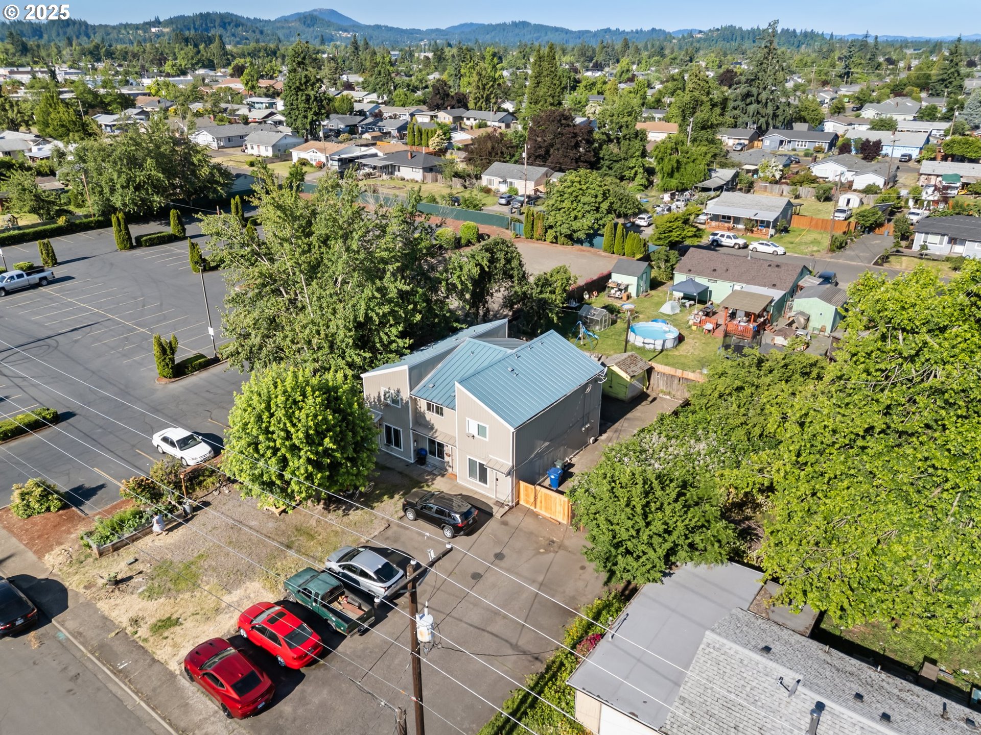 1720 17th Street Springfield, OR 97477 - Photo 14 of 23 an aerial view of residential houses with outdoor space
