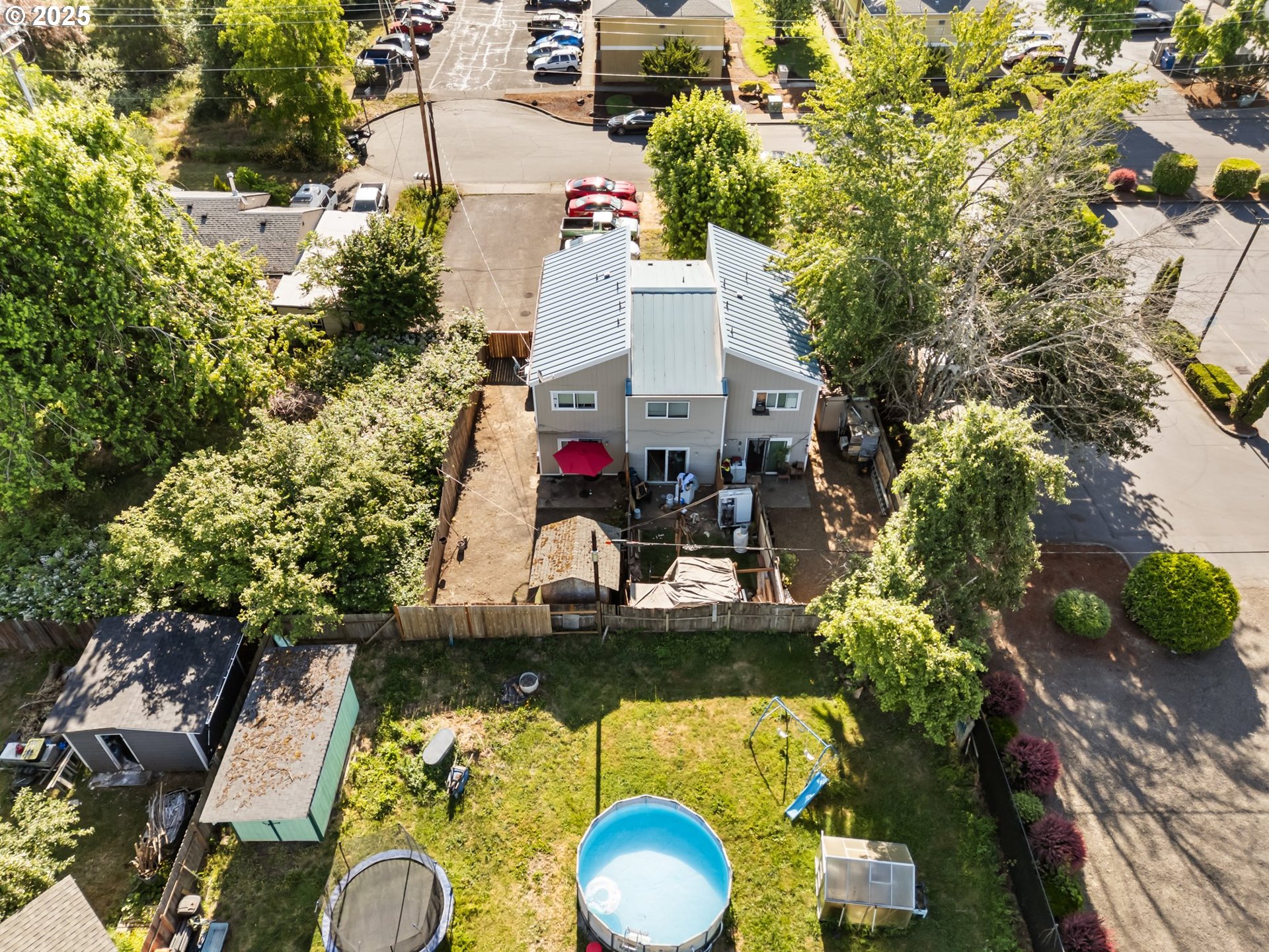 1720 17th Street Springfield, OR 97477 - Photo 15 of 23 an aerial view of a house with swimming pool and lake view