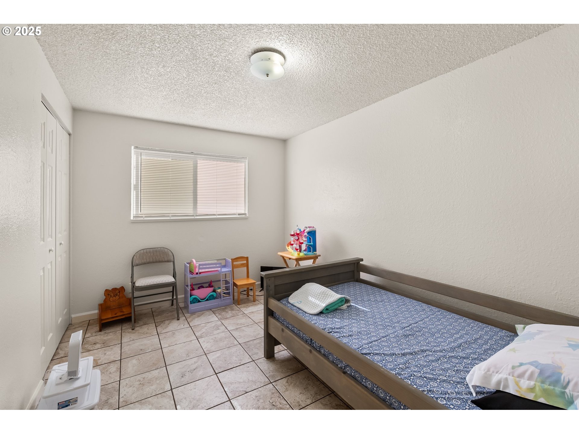 1720 17th Street Springfield, OR 97477 - Photo 5 of 23 a living room with furniture and a window