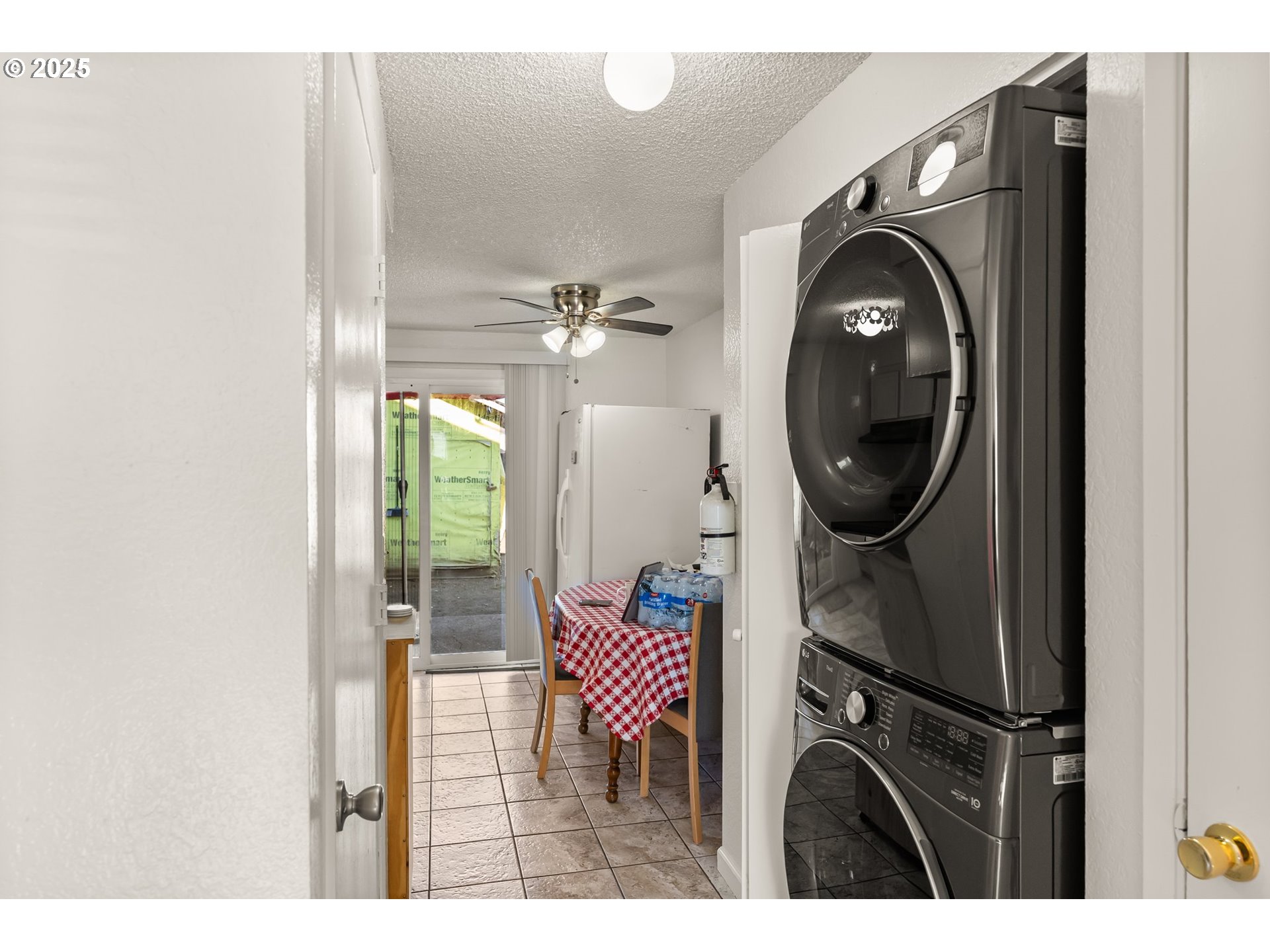 1720 17th Street Springfield, OR 97477 - Photo 7 of 23 a view of a hallway with washer and dryer