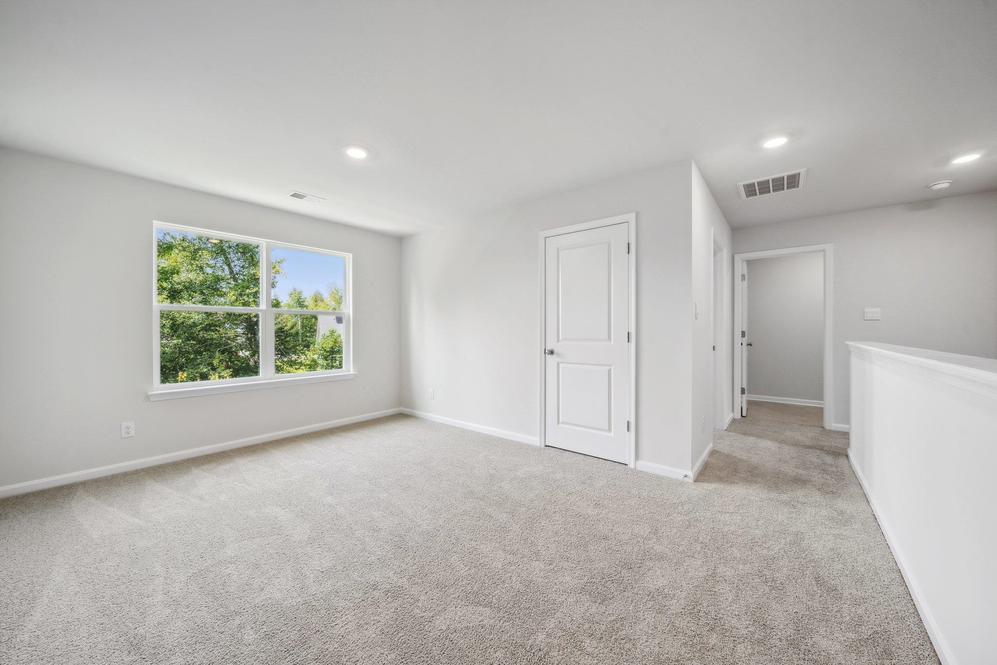 240 Waterfront Drive Raphine, VA 24472 - Photo 23 of 29 a view of a big room with windows and yard