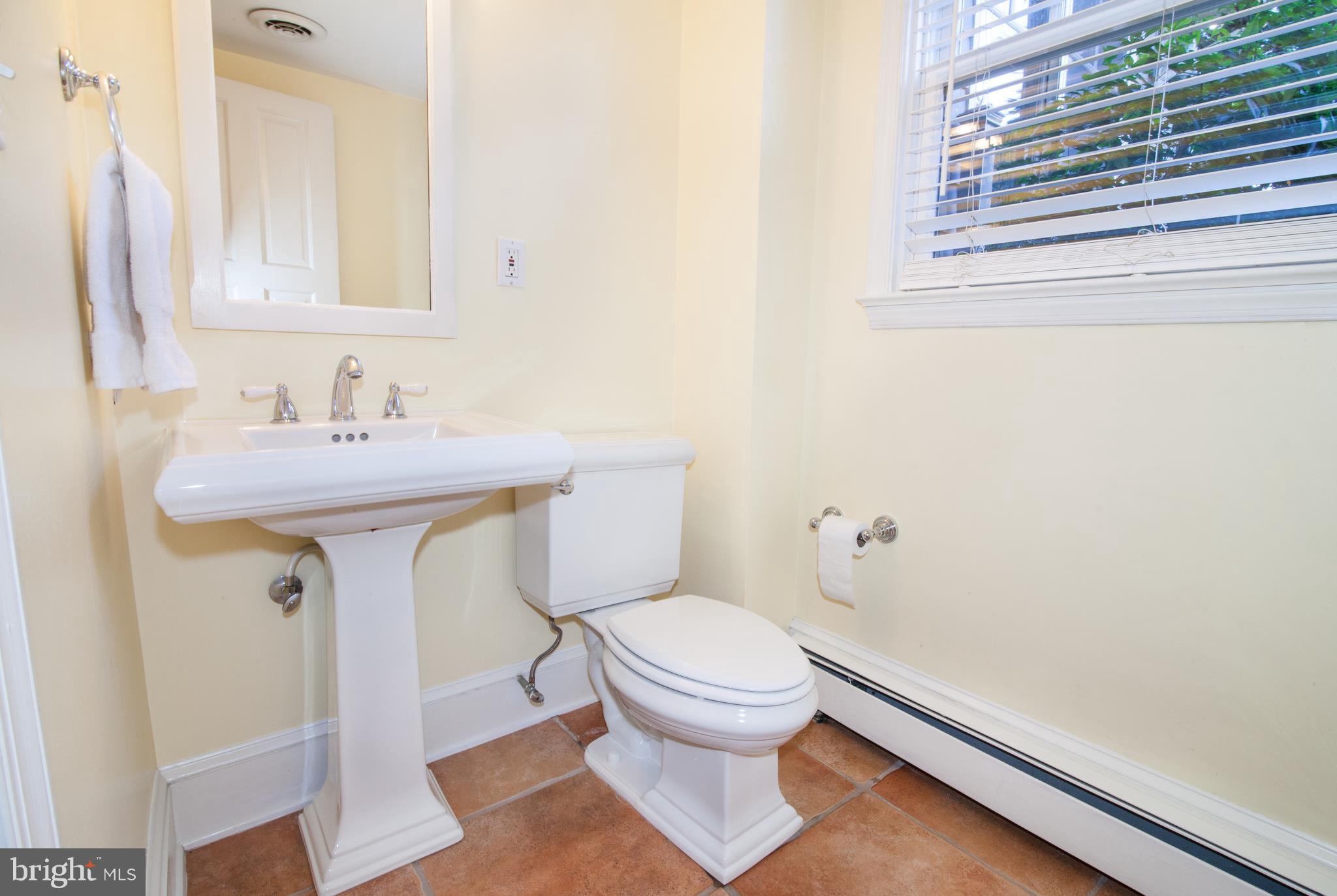 1912 Harwood Road Annapolis, MD 21409 - Photo 23 of 37 Half Bath with large window and ceramic tile floor