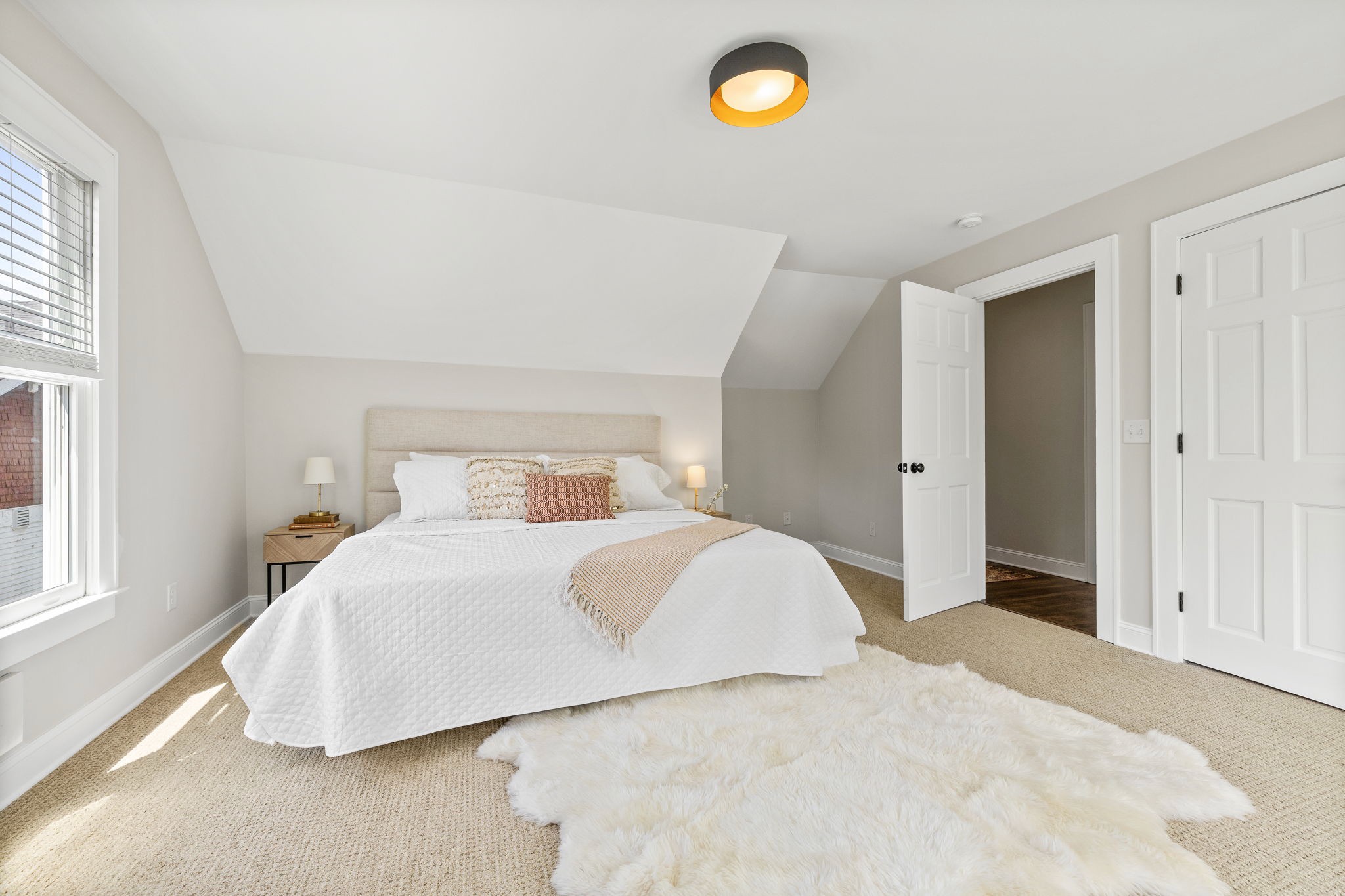 1412 Ordway Place Nashville, TN 37206 - Photo 57 of 70 a bedroom with a bed and window