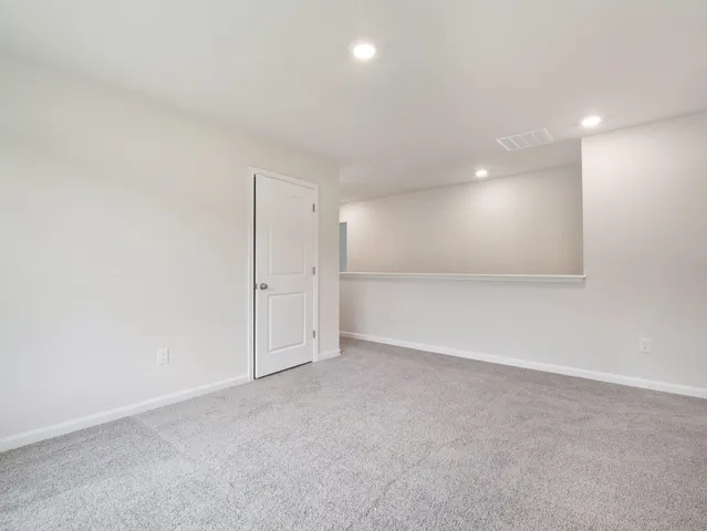 an empty room with an entryway