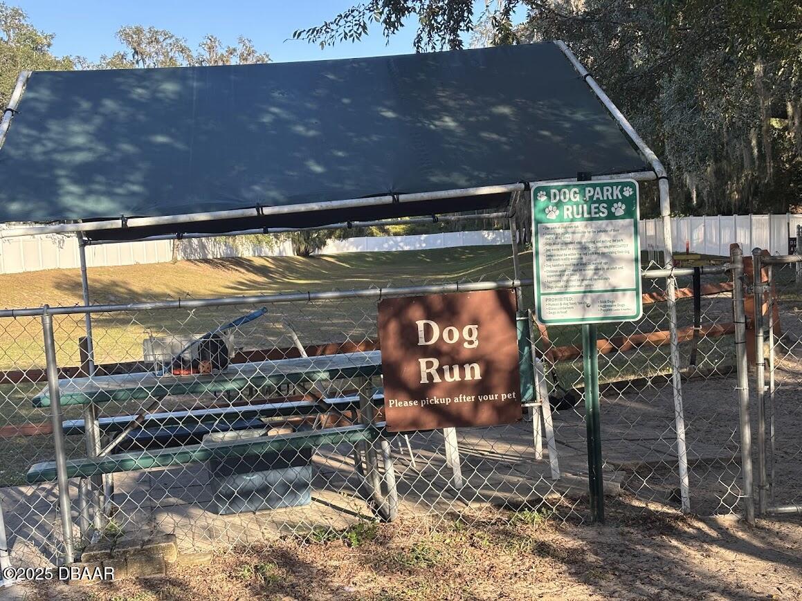 25145 Northeast 140th Loop Salt Springs, FL 32134 - Photo 21 of 48 a view of a chairs and table in the patio