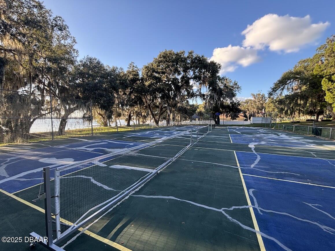 25145 Northeast 140th Loop Salt Springs, FL 32134 - Photo 31 of 48 a view of a tennis court