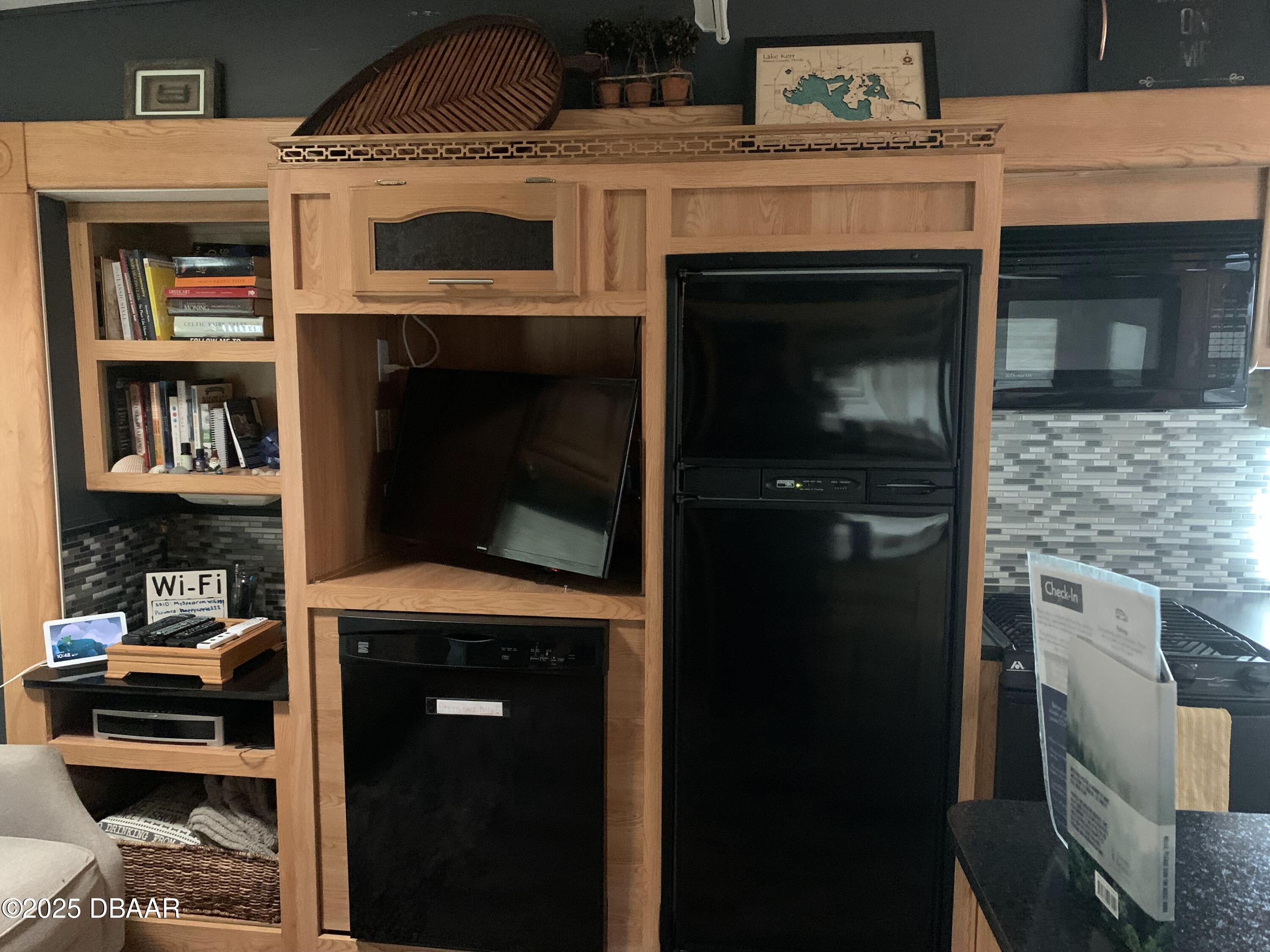 25145 Northeast 140th Loop Salt Springs, FL 32134 - Photo 9 of 48 a view of washer and dryer