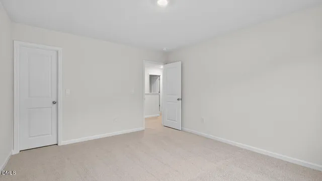 a bathroom with double sink and a mirror