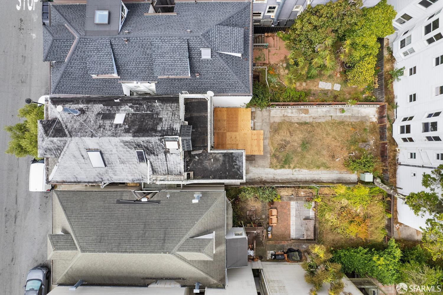 1264 3rd Avenue San Francisco, CA 94122 - Photo 6 of 10 an aerial view of residential houses with outdoor space